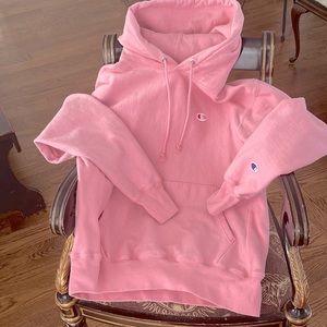 Mens Champion reverse weave small c hoodie in color guava.